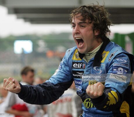 SAO PAULO, BRAZIL:  Spanish Formula One driver Fernando Alonso of Renault celebrates his World Champion title after arriving third in the Brazilian F1 GP, 25 September, 2005 at the Interlagos racetrack in Sao Paulo, Brazil. AFP PHOTO ANTONIO SCORZA  (Photo credit should read ANTONIO SCORZA/AFP via Getty Images)